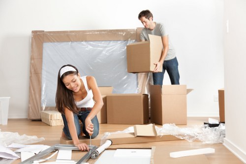House movers working in a Swiss Cottage residential street