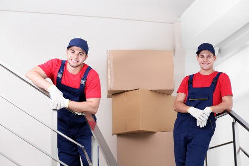 Local movers handling furniture for a residential or office relocation