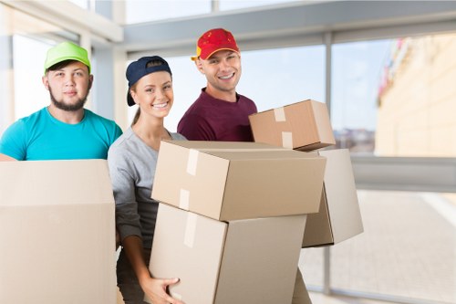 Removal van and packed boxes for a house move in Swiss Cottage
