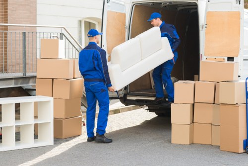 Man with van service loading items for transport