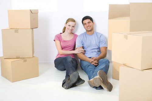 Driver checking a van and equipment before a moving job