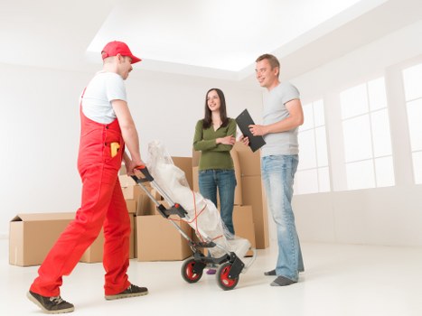 Office relocation services in Swiss Cottage with boxes and furniture