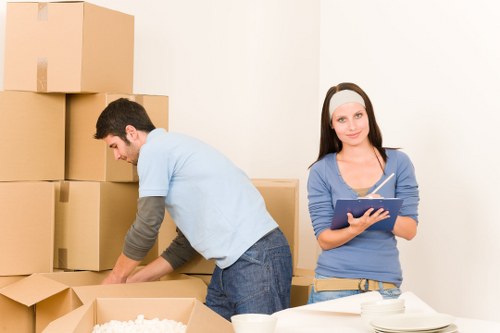 Residential flat move support in Swiss Cottage with boxes and furniture