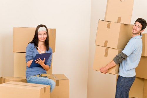Removal truck loading boxes and furniture for a Swiss Cottage move