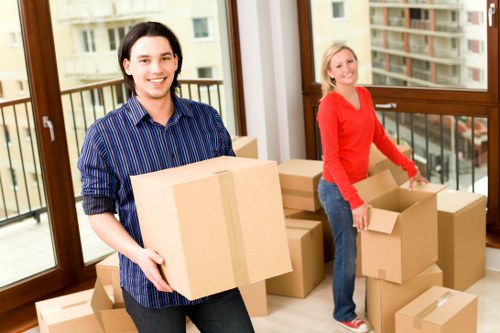 Packing and loading belongings into a van for a Swiss Cottage move